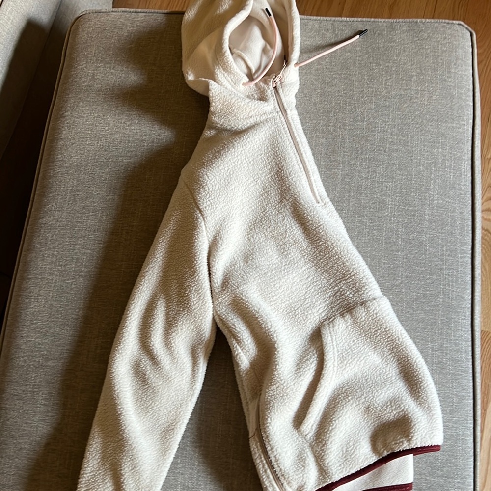 Warm jacket/sweatshirt from Colorado, Creme, Burgundy, and pink.